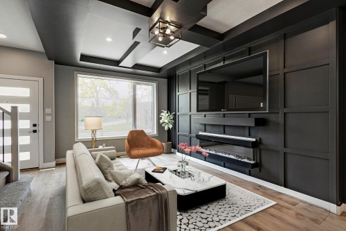 11633 St Albert Trail, Edmonton, AB - Indoor Photo Showing Living Room With Fireplace