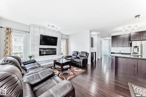 1452 30 Street, Edmonton, AB - Indoor Photo Showing Living Room With Fireplace