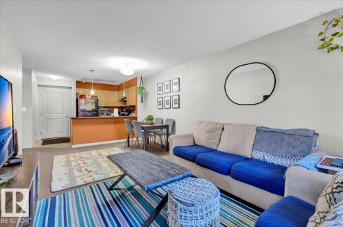 114 11453 Ellerslie Road, Edmonton, AB - Indoor Photo Showing Living Room