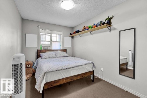 114 11453 Ellerslie Road, Edmonton, AB - Indoor Photo Showing Bedroom