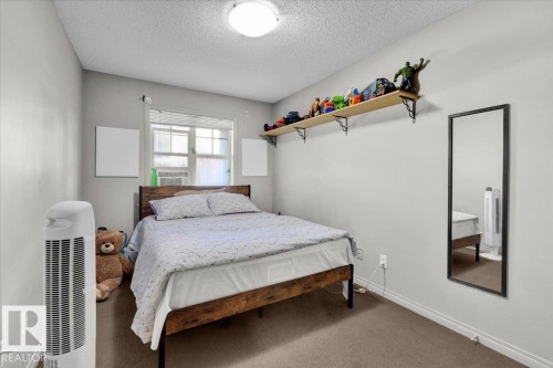 114 11453 Ellerslie Road, Edmonton, AB - Indoor Photo Showing Bedroom