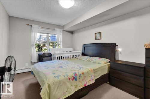 114 11453 Ellerslie Road, Edmonton, AB - Indoor Photo Showing Bedroom