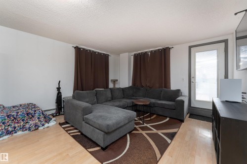 101 6220 134 Avenue, Edmonton, AB - Indoor Photo Showing Living Room