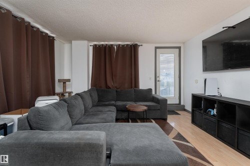 101 6220 134 Avenue, Edmonton, AB - Indoor Photo Showing Living Room