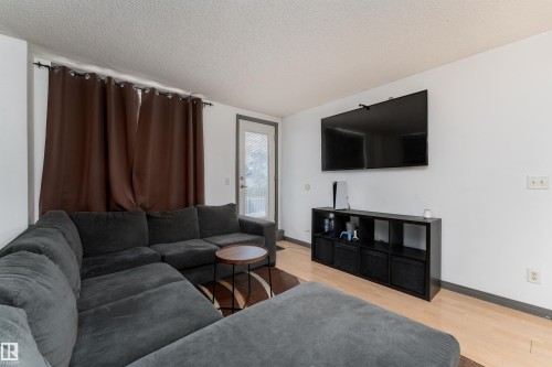 101 6220 134 Avenue, Edmonton, AB - Indoor Photo Showing Living Room