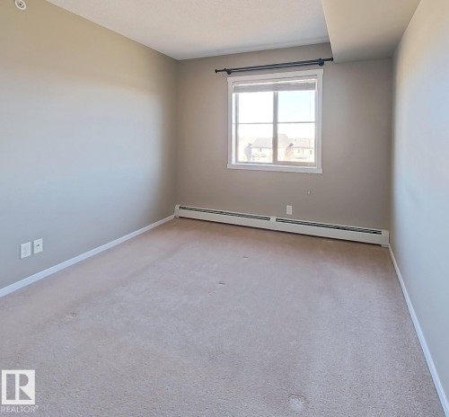 404 5370 Chappelle Road, Edmonton, AB - Indoor Photo Showing Other Room