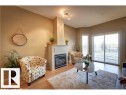 112 4312 139 Avenue, Edmonton, AB  - Indoor Photo Showing Living Room With Fireplace 