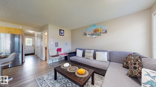 1150 37B Ave, Edmonton, AB - Indoor Photo Showing Living Room