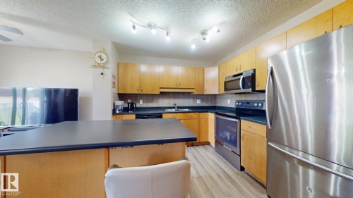 1150 37B Ave, Edmonton, AB - Indoor Photo Showing Kitchen With Stainless Steel Kitchen With Double Sink