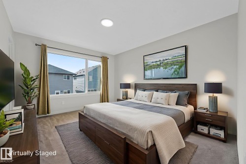 Carpeted bedroom with baseboards - 1813 Collip View View, Edmonton, AB - Indoor Photo Showing Bedroom