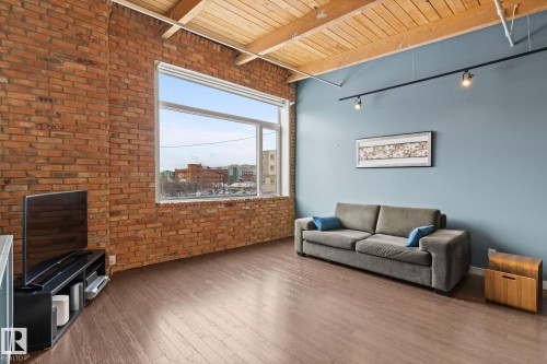 213 10309 107 Street, Edmonton, AB - Indoor With Fireplace