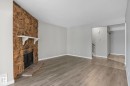 329 10404 24 Avenue, Edmonton, AB  - Indoor Photo Showing Other Room With Fireplace 