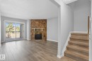 329 10404 24 Avenue, Edmonton, AB  - Indoor Photo Showing Living Room With Fireplace 