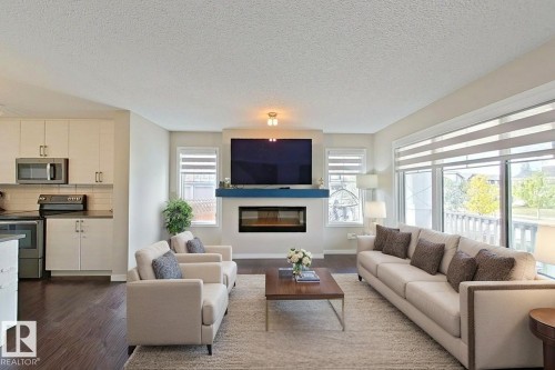 4303 Prowse Link, Edmonton, AB - Indoor Photo Showing Living Room With Fireplace