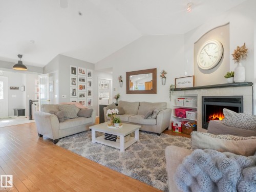138 Pipestone Manor, Millet, AB - Indoor Photo Showing Living Room With Fireplace