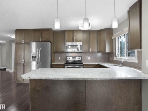 101 2207 44 Avenue, Edmonton, AB - Indoor Photo Showing Kitchen With Upgraded Kitchen