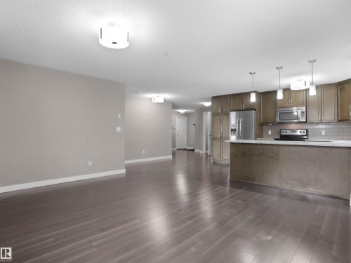 101 2207 44 Avenue, Edmonton, AB - Indoor Photo Showing Kitchen With Upgraded Kitchen