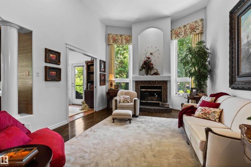 22 Prestige Point(E), Edmonton, AB - Indoor Photo Showing Living Room With Fireplace