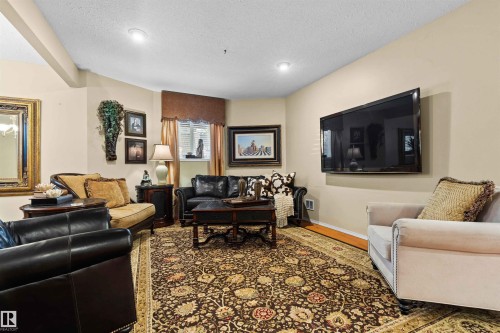 22 Prestige Point(E), Edmonton, AB - Indoor Photo Showing Living Room