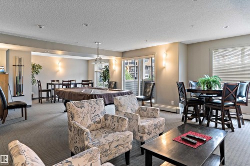 238 6076 Schonsee Way Nw, Edmonton, AB - Indoor Photo Showing Living Room