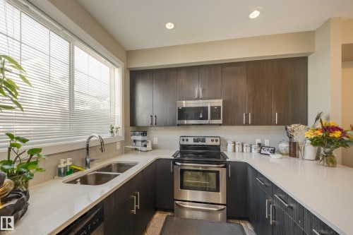 31 2803 James Mowatt Trail, Edmonton, AB - Indoor Photo Showing Kitchen With Double Sink