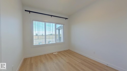 Main 1039 Aster Boulevard, Edmonton, AB - Indoor Photo Showing Other Room
