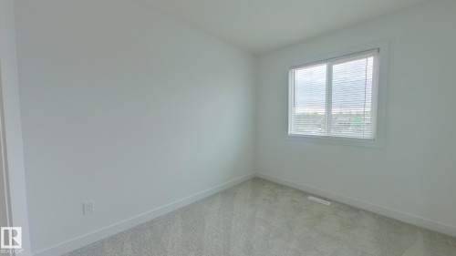 Main 1039 Aster Boulevard, Edmonton, AB - Indoor Photo Showing Other Room