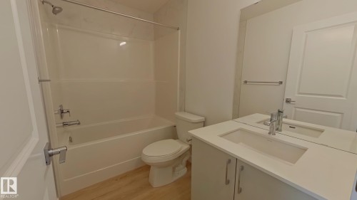Main 1039 Aster Boulevard, Edmonton, AB - Indoor Photo Showing Bathroom