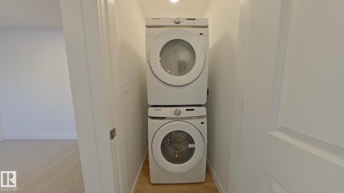 Main 1039 Aster Boulevard, Edmonton, AB - Indoor Photo Showing Laundry Room