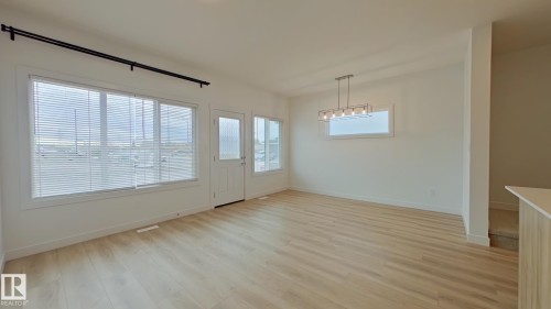 Main 1039 Aster Boulevard, Edmonton, AB - Indoor Photo Showing Other Room