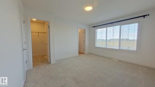 Main 1039 Aster Boulevard, Edmonton, AB - Indoor Photo Showing Other Room