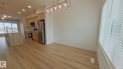 Main 1037 Aster Boulevard, Edmonton, AB - Indoor Photo Showing Kitchen