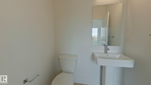 Main 1037 Aster Boulevard, Edmonton, AB - Indoor Photo Showing Bathroom