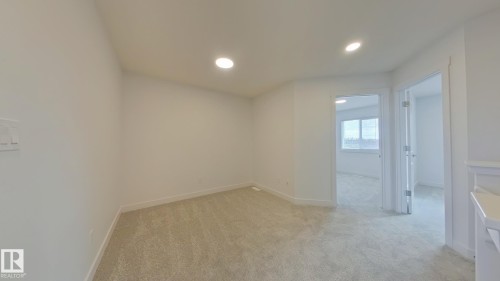 Main 1037 Aster Boulevard, Edmonton, AB - Indoor Photo Showing Other Room