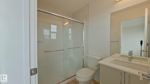 Main 1037 Aster Boulevard, Edmonton, AB - Indoor Photo Showing Bathroom