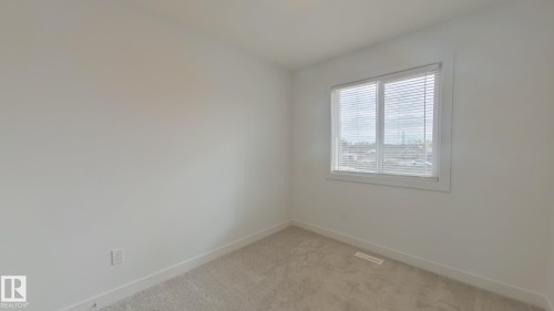 Main 1037 Aster Boulevard, Edmonton, AB - Indoor Photo Showing Other Room