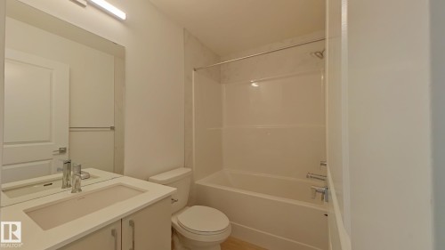 Main 1037 Aster Boulevard, Edmonton, AB - Indoor Photo Showing Bathroom