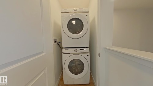 Main 1037 Aster Boulevard, Edmonton, AB - Indoor Photo Showing Laundry Room