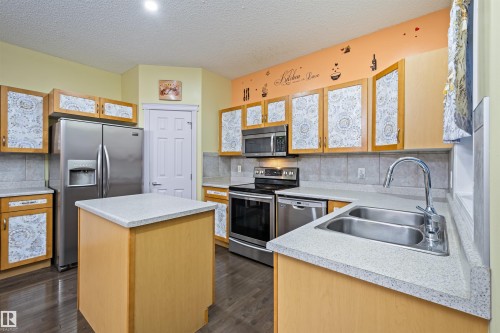 3449 28 Street, Edmonton, AB - Indoor Photo Showing Kitchen With Stainless Steel Kitchen With Double Sink