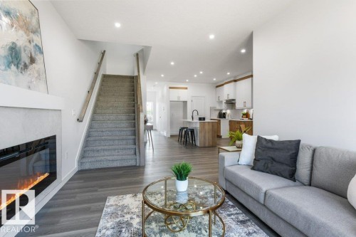 9805 106 Avenue, Morinville, AB - Indoor Photo Showing Living Room With Fireplace