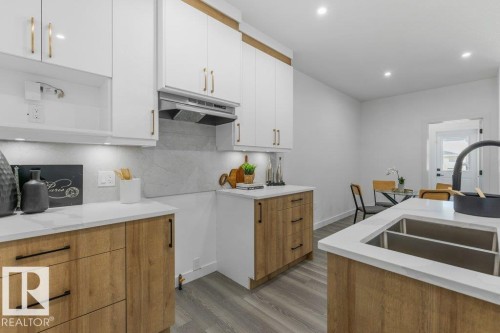 9805 106 Avenue, Morinville, AB - Indoor Photo Showing Kitchen With Double Sink