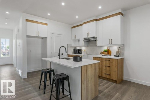 9805 106 Avenue, Morinville, AB - Indoor Photo Showing Kitchen With Upgraded Kitchen