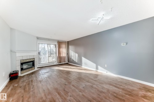 112 11716 100 Avenue, Edmonton, AB - Indoor With Fireplace