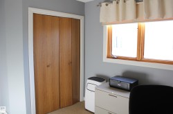 Office space featuring light colored carpet - 