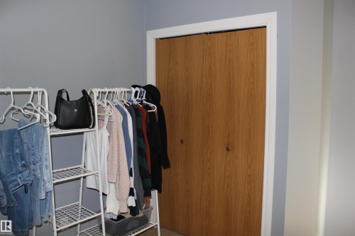 View of closet - 5221 54A Street, Elk Point, AB - Indoor Photo Showing Other Room