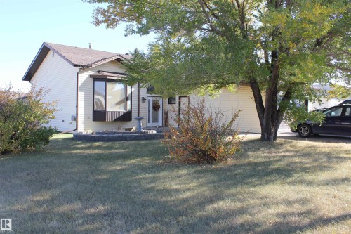 View of front of house with a front lawn - 5221 54A Street, Elk Point, AB - Outdoor