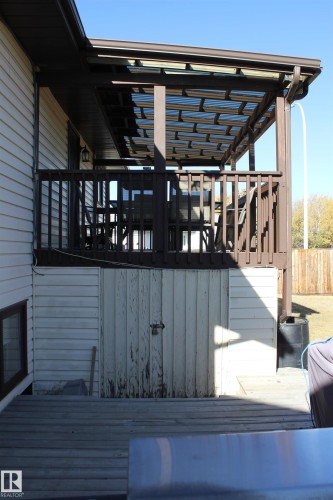 View of wooden deck - 5221 54A Street, Elk Point, AB - Outdoor With Deck Patio Veranda With Exterior