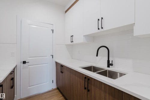 341 Munn Way, Leduc, AB - Indoor Photo Showing Kitchen With Double Sink
