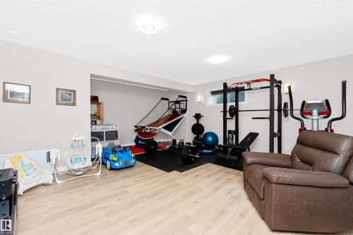 7404 May Common, Edmonton, AB - Indoor Photo Showing Gym Room