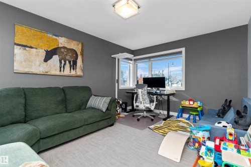 7404 May Common, Edmonton, AB - Indoor Photo Showing Living Room